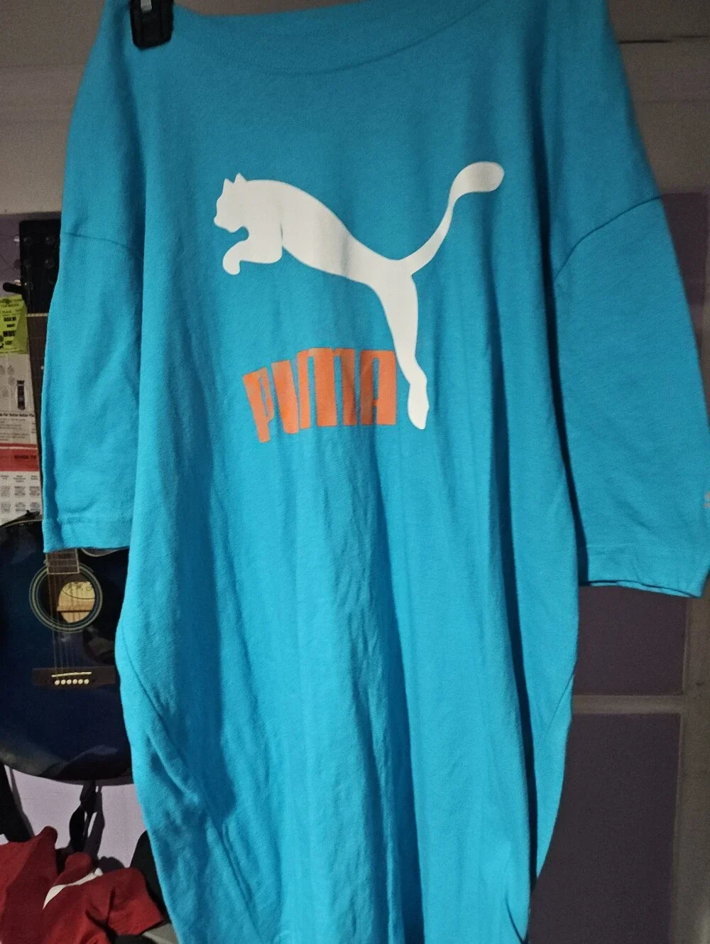 Puma Teal Tee with White Puma Logo and Orange Wordmark